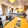 Photo 2: Dining Area / Kitchen