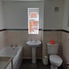 Photo 4: Private bathroom with bath 