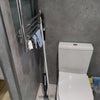 Photo 7: Toilet and towel dryer