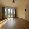Photo 2: Communal Space Downstairs 