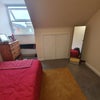 Photo 2: Room 2 - Large Eaves Storage (With Hanging Rail)