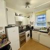 Photo 5: Kitchen- with washer dryer, dishwasher, fridge freezer, microwave, kettle, oven, hob, toaster and fu
