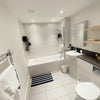 Photo 8: Shared bathroom