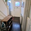 Photo 6: Main entrance hall with Large American Fridge Freezer, 2 shoe racks & Coat hanger hooks
