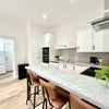 Photo 6: Bright and spacious fully equipped kitchen