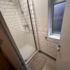 Photo 7: Second bathroom with walk-in shower and bright tiling