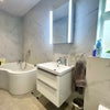 Photo 6: Large bathtub