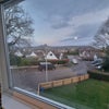 Photo 6: View from room across Axmouth and the Axe Valley