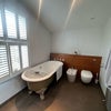 Photo 3: Large Bath with Showerhead