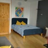Photo 7: Large double bed