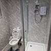 Photo 5: Shower and toilet 