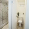 Photo 9: Bathroom #1 & Toilet 