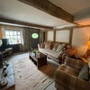 Photo 2: Living Room with Open Fire