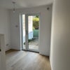 Photo 3: Bed area and view to back garden 