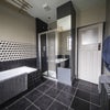 Photo 4: Stylish Bathroom