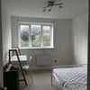 Photo 2: The room for rent - part furnished with bed mattress, desk, cabinet and clothes rail 