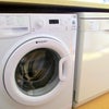 Photo 6: Modern kitchen appliances including two large fridges, two freezers and microwave with grill