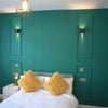 Photo 1: Bedroom 1 - Bed & Feature Wall