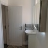 Photo 13: Sink/Cabinet (1)