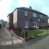 Photo 1: Front of Property