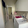 Photo 5: The downstairs bathroom/utility room with washer and dryer