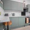 Photo 6: COMMUNAL KITCHEN