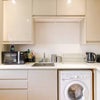 Photo 7: This is also a kitchen