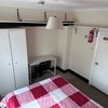 Photo 2: There is a double wardrobe, desk, chair
