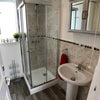 Photo 8: Downstairs shower room with separate loo