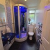 Photo 9: Modern bathroom with steam shower