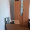 Photo 5: Single room wardrobe, with folder, filing cabinet; kettle and Denby cup and saucer as this room is
