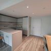 Photo 7: Otherwise of living room with kitchen and dining table