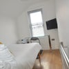 Photo 3: Beautiful Double, with plenty of storage, smart TV and desk and chair