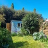 Photo 4: Back garden ,also a patio area with seating  not shown