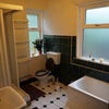 Photo 5: Large bathroom with shower cubicle and bath.