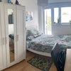 Photo 2: Your room with different arrangement 