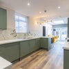 Photo 7: COMMUNAL KITCHEN