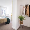 Photo 5: Great hanging space and also a chest of drawers