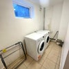 Photo 7: Laundry room