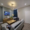 Photo 2: Big communal living room with Digital TV