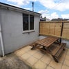 Photo 8: Outside picnic area with large BBQ