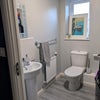 Photo 4: Downstairs toilet in main house. Communal access