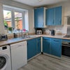 Photo 6: Kitchen in main house. Communal access