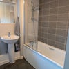 Photo 5: Upstairs bathroom in main house. Communal access