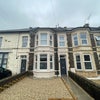 Photo 2: House Front