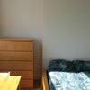 Photo 2: Bed in room with drawers and double bed