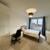 Photo 1: Double bed with large wardrobe, two bedside tables, desk, chair and extra storage unit