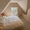 Photo 2: South facing bedroom wtih fitted wardrobes