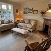 Photo 8: South facing living room with bay window
