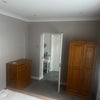 Photo 3: FRONT LARGE BEDROOM -  AVAILABLE